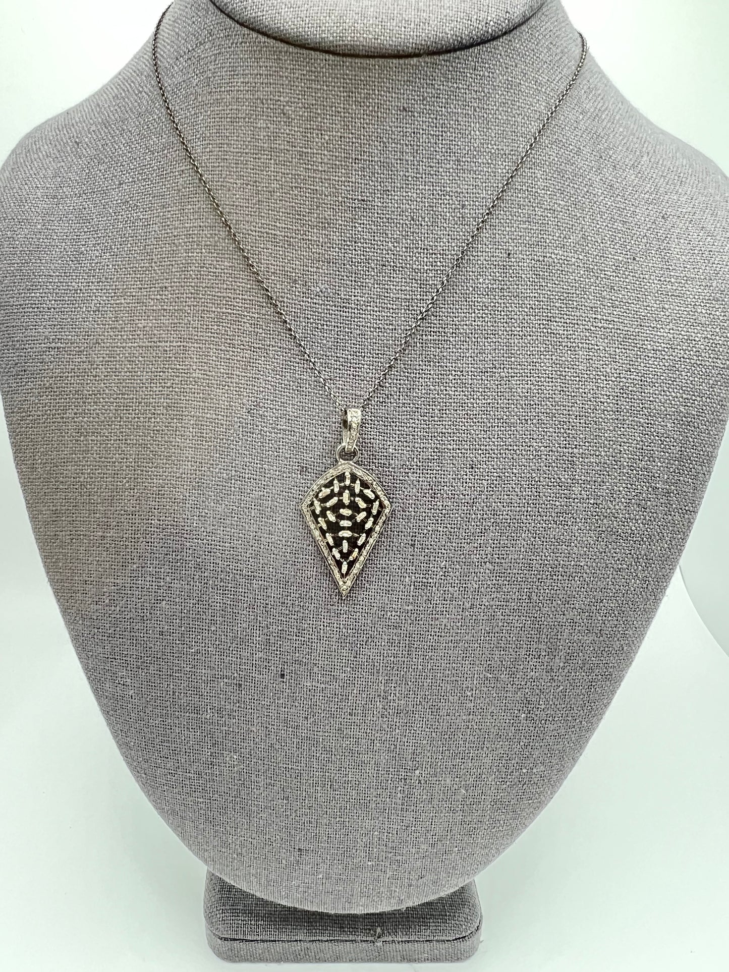 Arrowhead with baguette diamonds, diamond and oxidized sterling silver chain